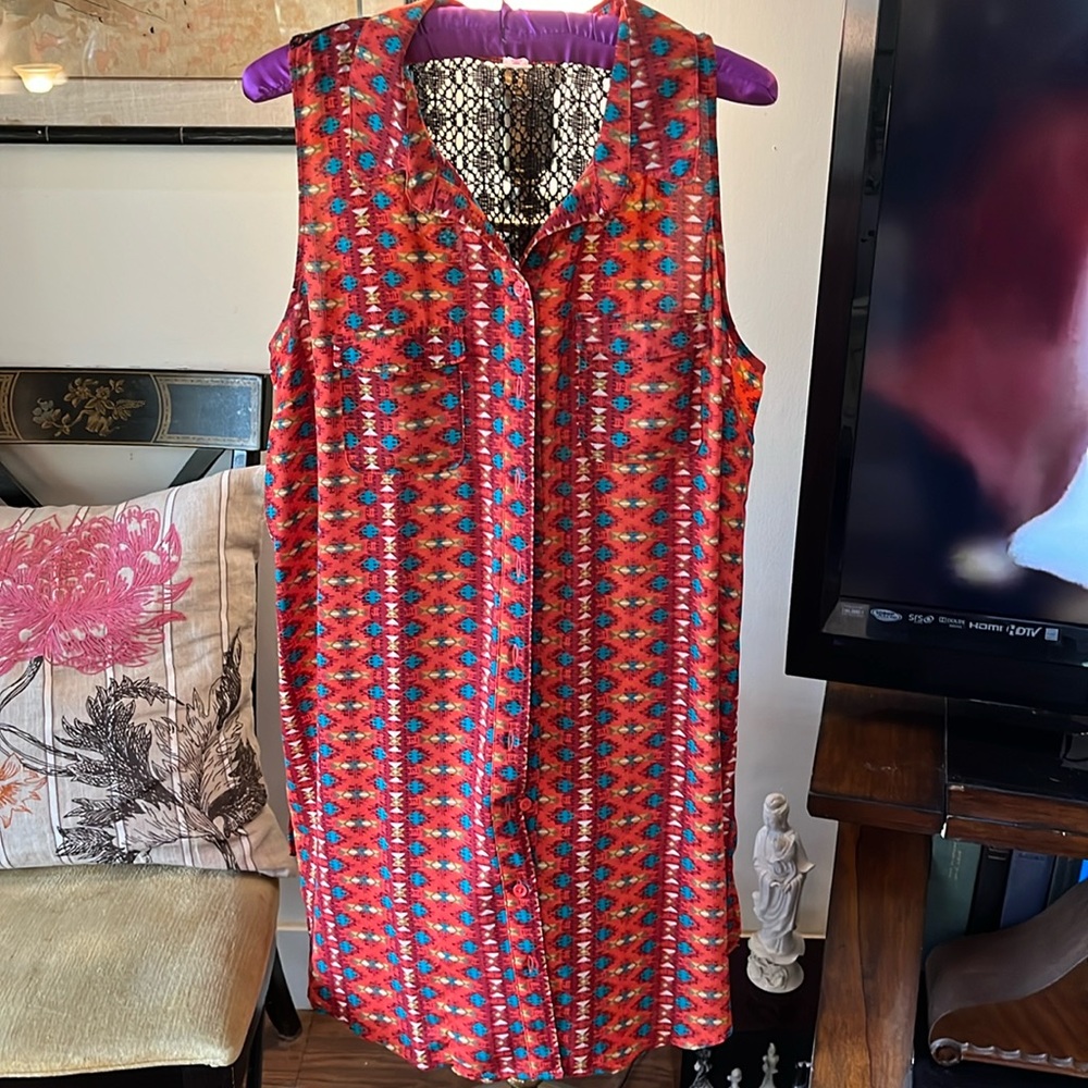 Xhileration sleeveless tunic top.